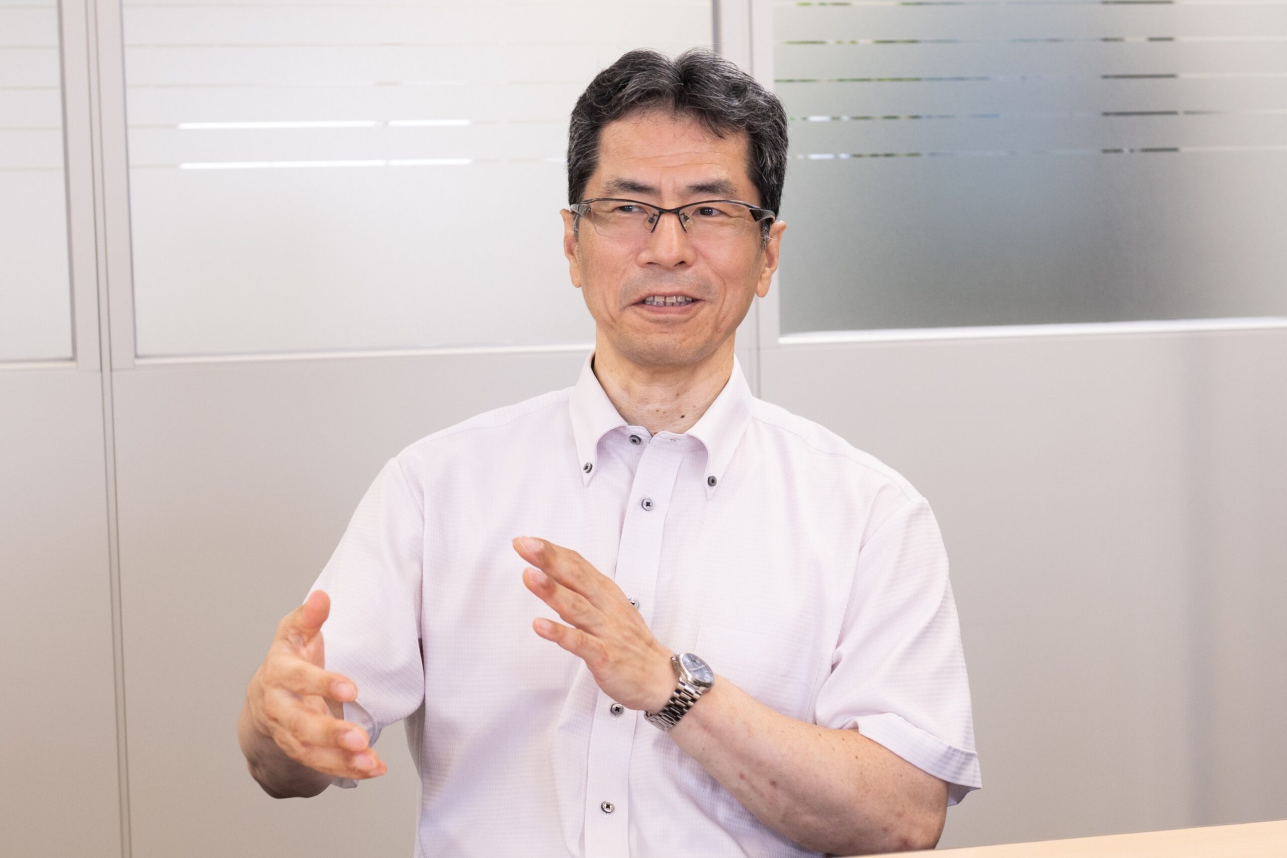 4.常務取締役 佐藤様